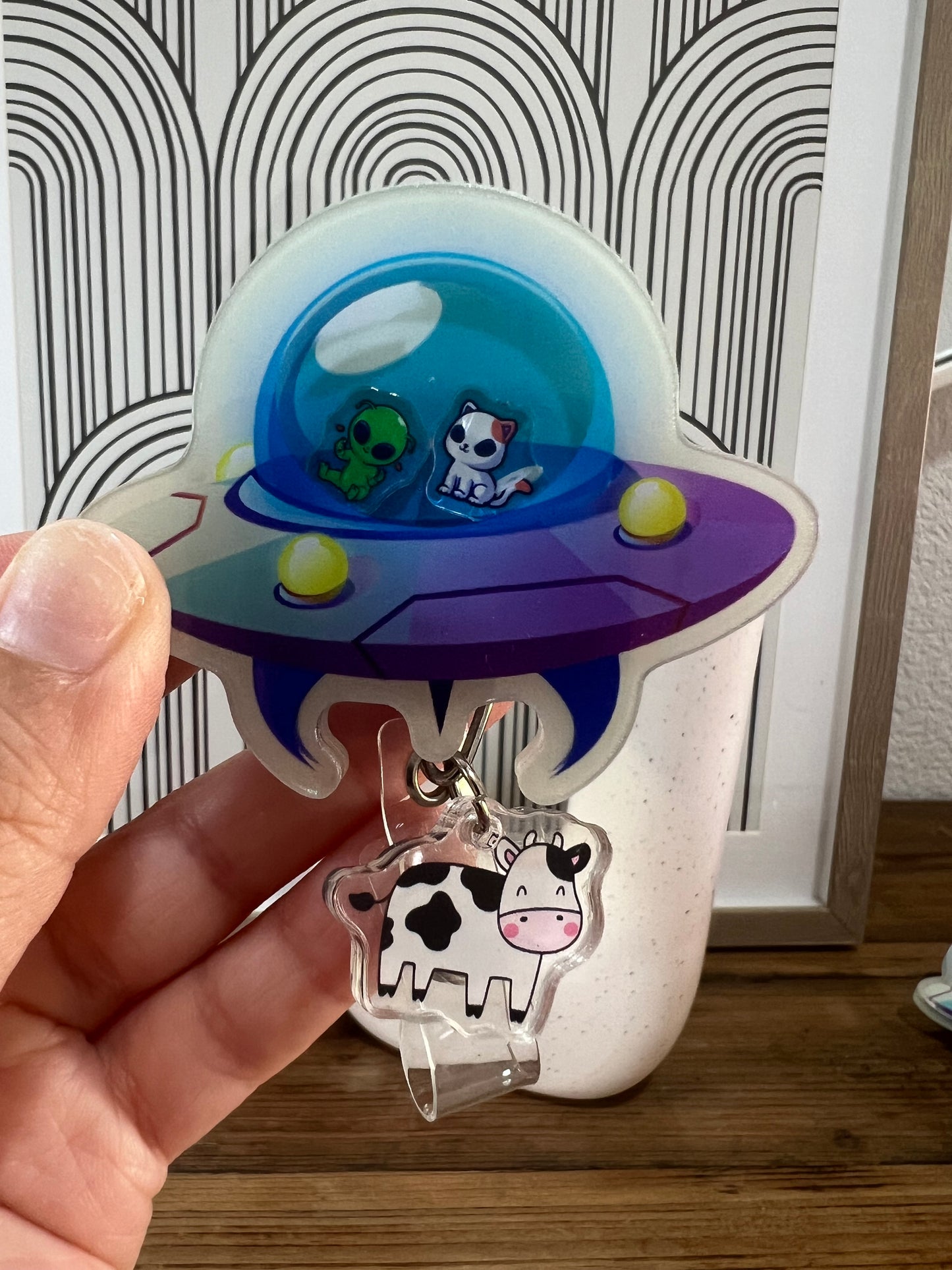 UFO badge reel: cow abduction, glows in the dark, nurse,