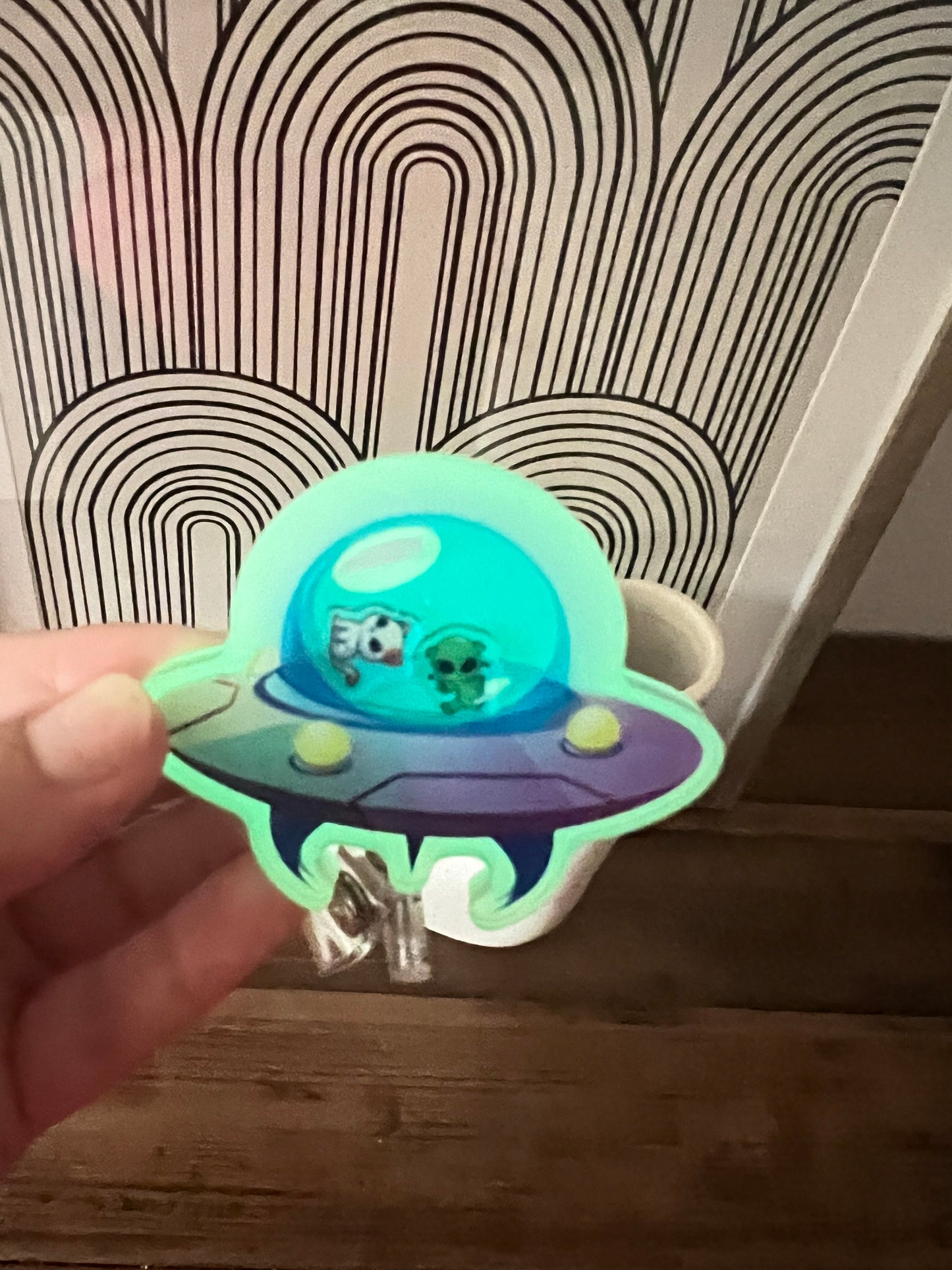 UFO badge reel: cow abduction, glows in the dark, nurse,