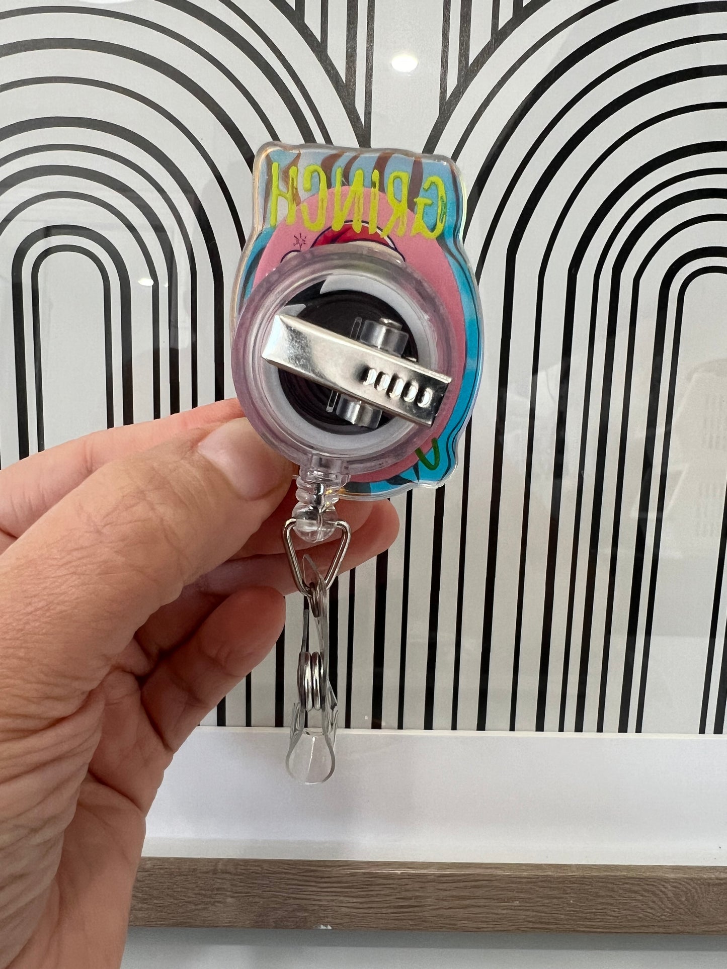 Grinch Vibes badge reel