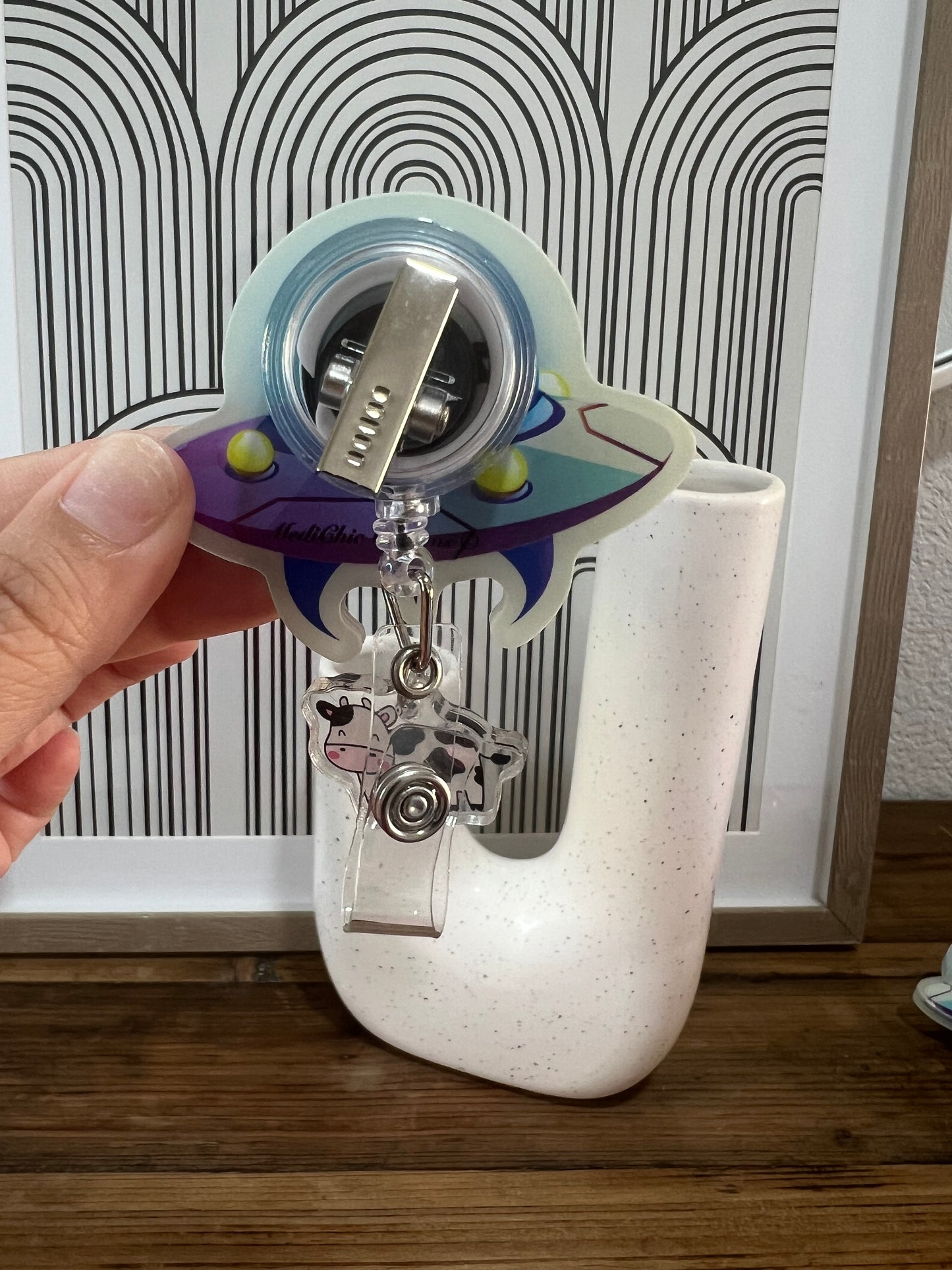 UFO badge reel: cow abduction, glows in the dark, nurse,