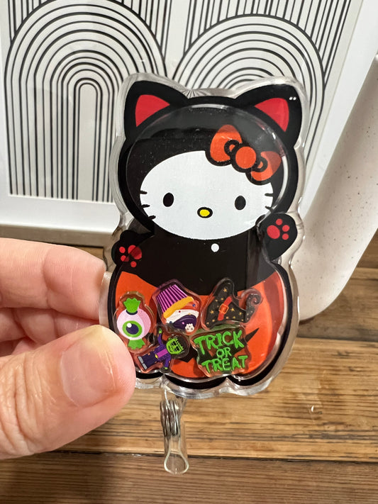 Halloween Hello Kitty badge reel