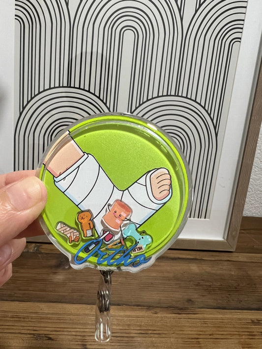 Ortho, shaker badge reel