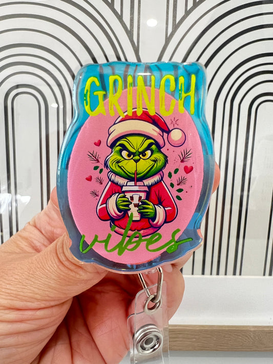 Grinch Vibes badge reel
